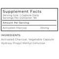 Supplement facts label for activated charcoal capsules with serving size, servings per container, and ingredient list.