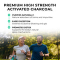 Activated_Charcoal Two people running outdoors with text about premium high strength activated charcoal benefits.