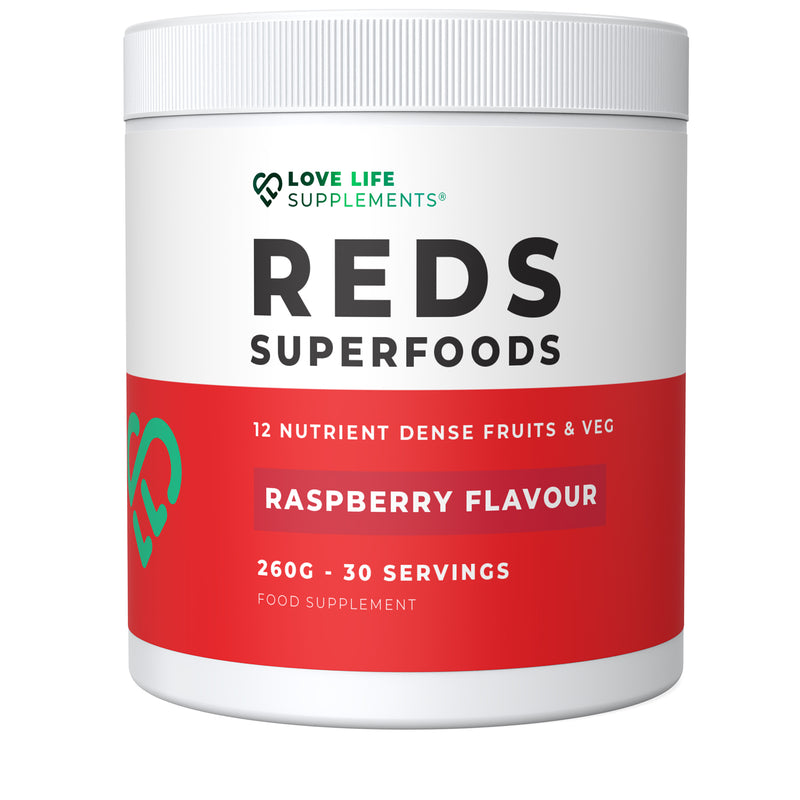 Supplement container labeled 'REDS Superfoods' with raspberry flavor on a white background